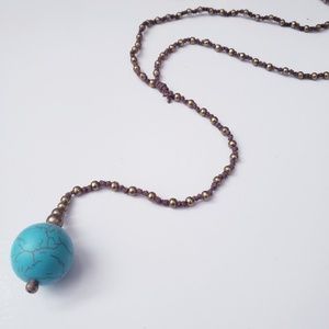 Long single bead necklace